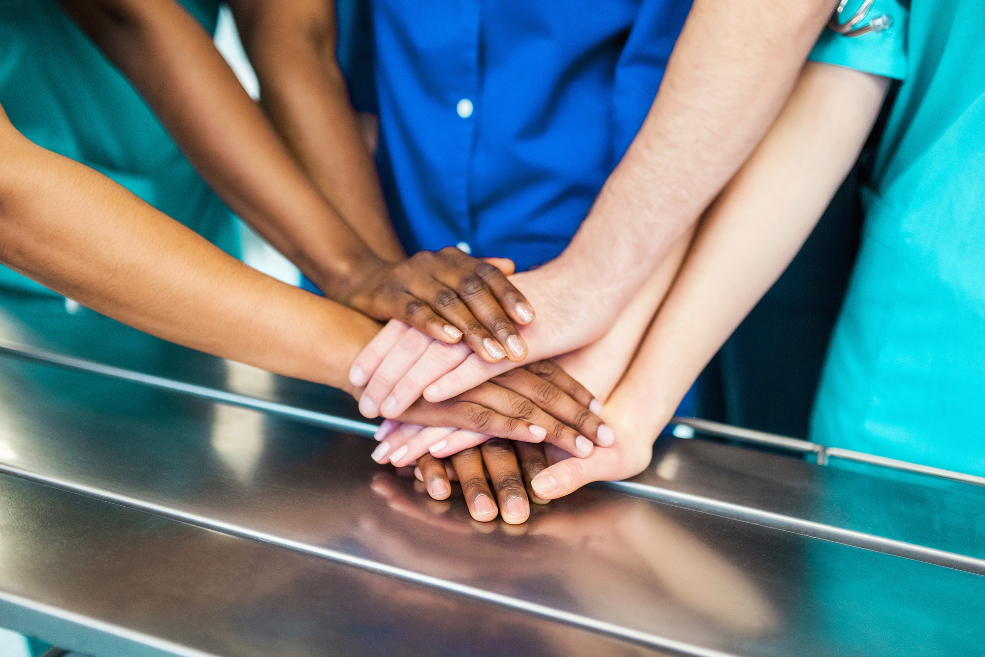 Diverse Group Of Medical Worker Hands Together